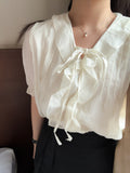 法式女孩的spring ruffle blouse